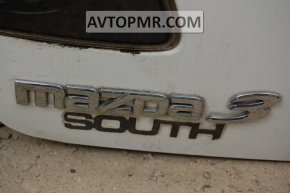 Надпись "MAZDA" крышки багажника Mazda3 03-08 HB