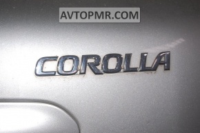 Эмблема надпись Corolla двери багажника Toyota Corolla e12 02-06 5d 3d