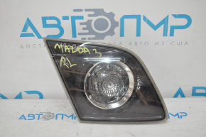 Ліхтар внутрішній кришка багажника лівий Mazda3 03-08 HB рест