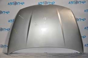 Капот голый Mazda CX-7 06-09 серебро, с небольшой вмятиной справой стороны 8/10