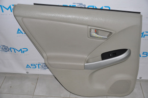 Обшивка дверей картка зад лев Toyota Prius 30 10-15 шкіра беж