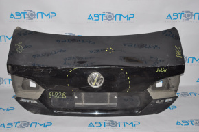 Крышка багажника VW Jetta 11-14 USA черн вмятина у значка, тычок сверху