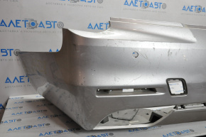 Бампер задний голый Cadillac CTS 14-16 под парктроники, без BSM, серебро треснут внутри