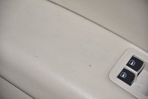 Обшивка дверей картка перед лев VW Passat b7 12-15 USA беж, порвана шкіра