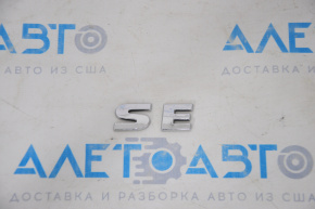 Эмблема надпись SE крышки багажника VW Passat b7 12-15 USA