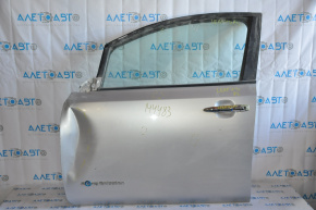 Дверь голая передняя левая Nissan Leaf 13-17 серебро замята у крыла тычки