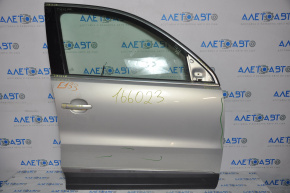 Дверь голая передняя правая VW Tiguan 09-17 серебро LA7W