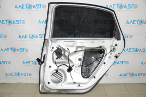 Дверь голая задняя правая VW Passat b7 12-15 USA серебро Lb7 12-15W тычки