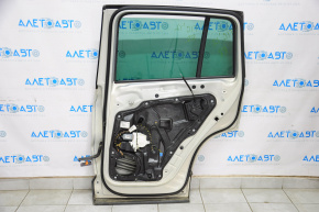 Дверь голая задняя правая VW Tiguan 09-17 серебро 7B, вмятины