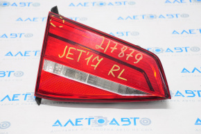 Фонарь внутренний крышка багажника левый VW Jetta 15 USA галоген светлый, паутинка