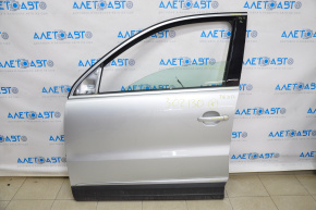 Дверь голая передняя левая VW Tiguan 09-17 серебро LA7W