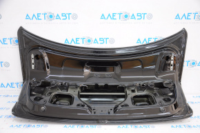 Крышка багажника VW Jetta 15-18 USA черный L041, тычки