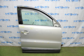 Дверь голая передняя правая VW Tiguan 09-17 серебро LR7L, тычки