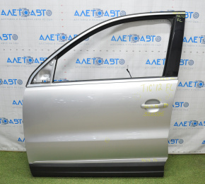 Дверь голая передняя левая VW Tiguan 09-17 серебро LA7W тычки, крашенная