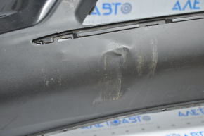 Бампер передний голый Nissan Rogue 14-16 черный, примята нижняя часть, царапины