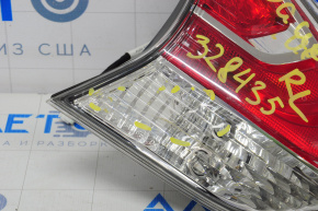 Ліхтар внутрішній кришка багажника лівий Nissan Rogue 14-16 тріщини
