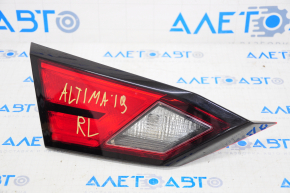 Ліхтар внутрішній кришка багажника лівий Nissan Altima 19- топляк