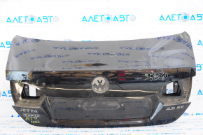 Крышка багажника VW Jetta 11-14 USA черный L041 тычка, примята