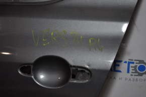 Дверь голая задняя левая Nissan Versa 12-19 usa графит KAD, тычки