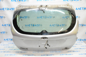 Дверь багажника голая со стеклом Ford Focus mk3 15-18 рест 5d, серебро UX, вмятина