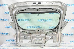 Дверь багажника голая со стеклом Ford Focus mk3 15-18 рест 5d, серебро UX, вмятина