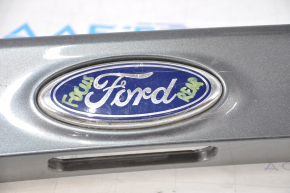 Молдинг двери багажника Ford Focus mk3 11-14 дорест 5d с эмблемой надломы крепления, царапины на эмблеме