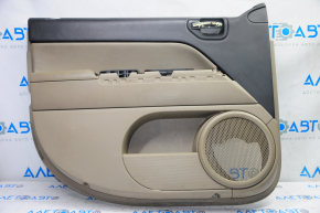 Обшивка двери карточка передняя левая Jeep Compass 11-16 беж с беж вставкой кожа, подлокотник резина, царапины