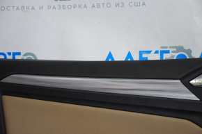Обшивка двери карточка передняя левая VW Jetta 19- черн с беж вставкой кожа, подлокотник кожа, молдинг серый тип 1, тычки
