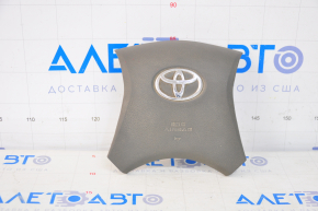 Накладка руля Toyota Camry v40 серая, царапины на эмблеме
