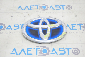 Эмблема решетки радиатора Toyota Camry v50 12-14 hybrid usa, песок