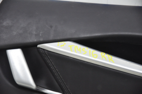 Обшивка двери карточка задняя правая Tesla Model S 16-20 рест, кожа черн, с подсветкой, тычка на хроме