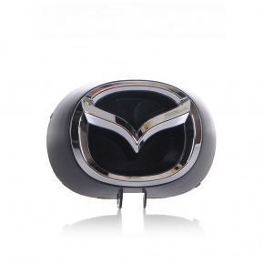 Эмблема решетки радиатора Mazda CX-9 16- новый неоригинал