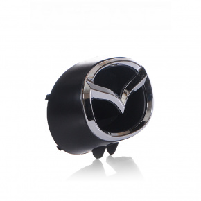 Емблема решітки радіатора Mazda CX-9 16- новий неоригінал