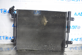 Радиатор кондиционера конденсер VW Tiguan 09-17 прижат снизу