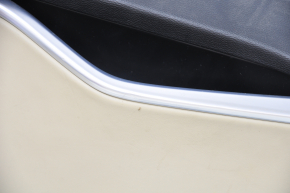 Обшивка двери карточка задняя левая Tesla Model S 12-15 дорест кожа черн, с беж вставкой, с подсветкой, тычка на хроме, дефект кожи