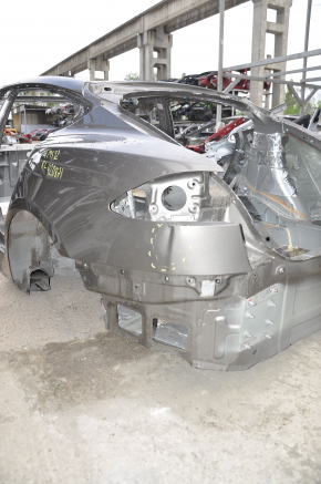 Чверть крило задня ліва Tesla Model S 12-20 на кузові, фільонка алюміній, коричнева, прим’ята
