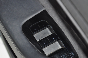 Обшивка дверей картка передня лев Tesla Model 3 18-20 шкіра чорна, з керуванням склопідйомником та кнопкою відкриття дверей, поліз лак