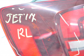 Фонарь внешний крыло левый VW Jetta 16-18 USA галоген, тёмный, царапины, трещины