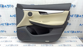 Обшивка дверей картка передня права Infiniti QX50 19- бежева шкіра подряпини і тички на накладці