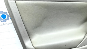 Обшивка дверей картка передня ліва Toyota Camry v40 шкіра сіра, побілів пластик, дефект шкіри