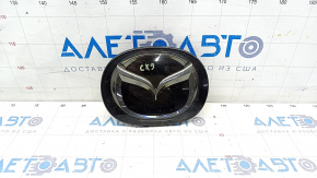 Эмблема решетки радиатора Mazda CX-9 16- под радар, песок
