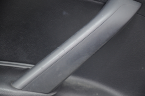 Обшивка двери карточка передняя левая VW Passat b7 12-15 USA черн с черн вставкой кожа, подлокотник кожа, молдинг серый глянец,царапины