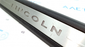 Накладка порога передня ліва Lincoln MKZ 13-16 чорна, з хромованою накладкою, з підсвічуванням, тичка