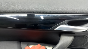 Обшивка дверей картка передня ліва BMW X1 F48 16-22 шкіра чорна, чорна вставка, підсвічування, подряпини