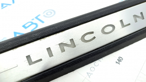 Накладка порога передня ліва Lincoln MKC 15- чорна з підсвічуванням, потерта