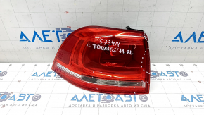 Фонарь внешний крыло левый VW Touareg 11-14 галоген, царапины, трещины, сломаны направляющие накладки