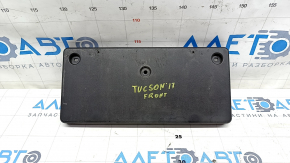 Майданчик номерного знака передня Hyundai Tucson 16-21 подряпини