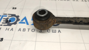 Ржавый рычаг задний развальный левый Toyota Camry V50, показать крепежные ушки.