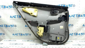 Обшивка для задней правой двери Toyota Camry V55, отображение состояния с небольшими царапинами.