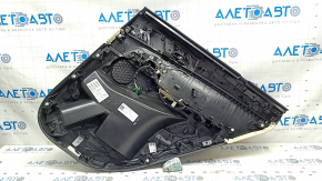 Обшивка задней левой двери BMW X5 G05 2019-2023 с кожаным подлокотником и вставкой под дерево.